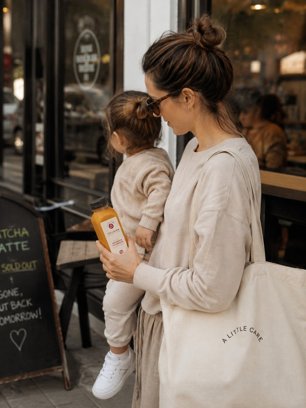 Family enjoying a healthy lifestyle with A Little Care collagen juice